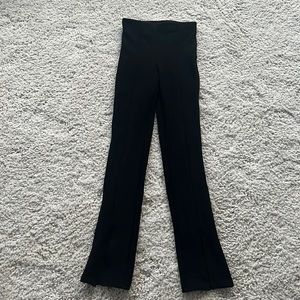 Black pants with slit at bottom